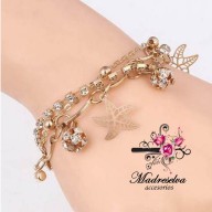 Pulsera de metal con multiples dijes 