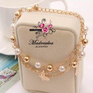 Pulsera de metal con multiples dijes 